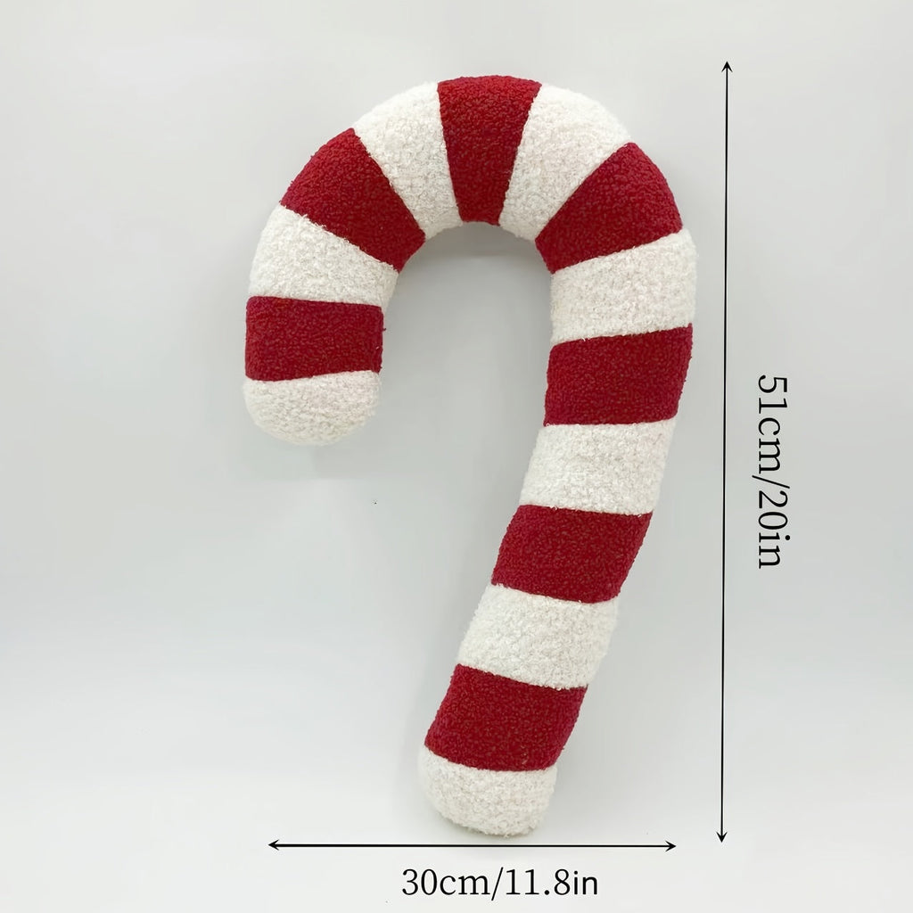 Coussin sucre d'orge rouge sur fond blanc avec les dimensions indiquées par le fabricant