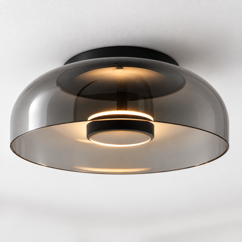 Gros plan sur la vasque en verre gris fumé et l'anneau LED allumé