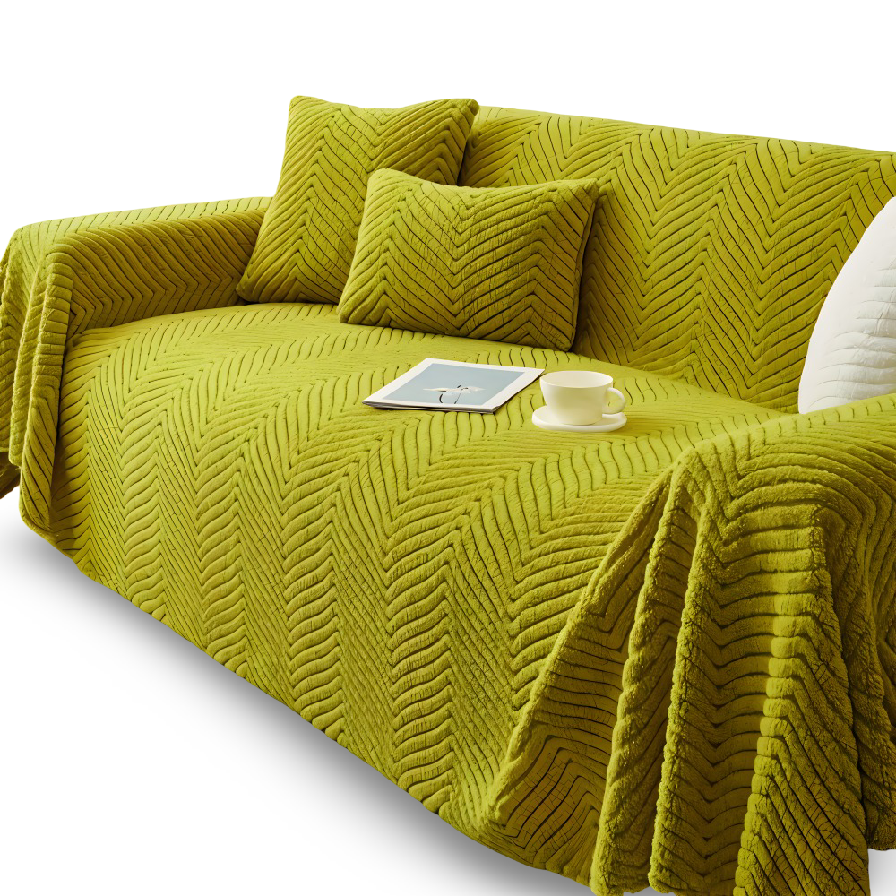 Plaid canapé vert à motif chevron sur fond blanc